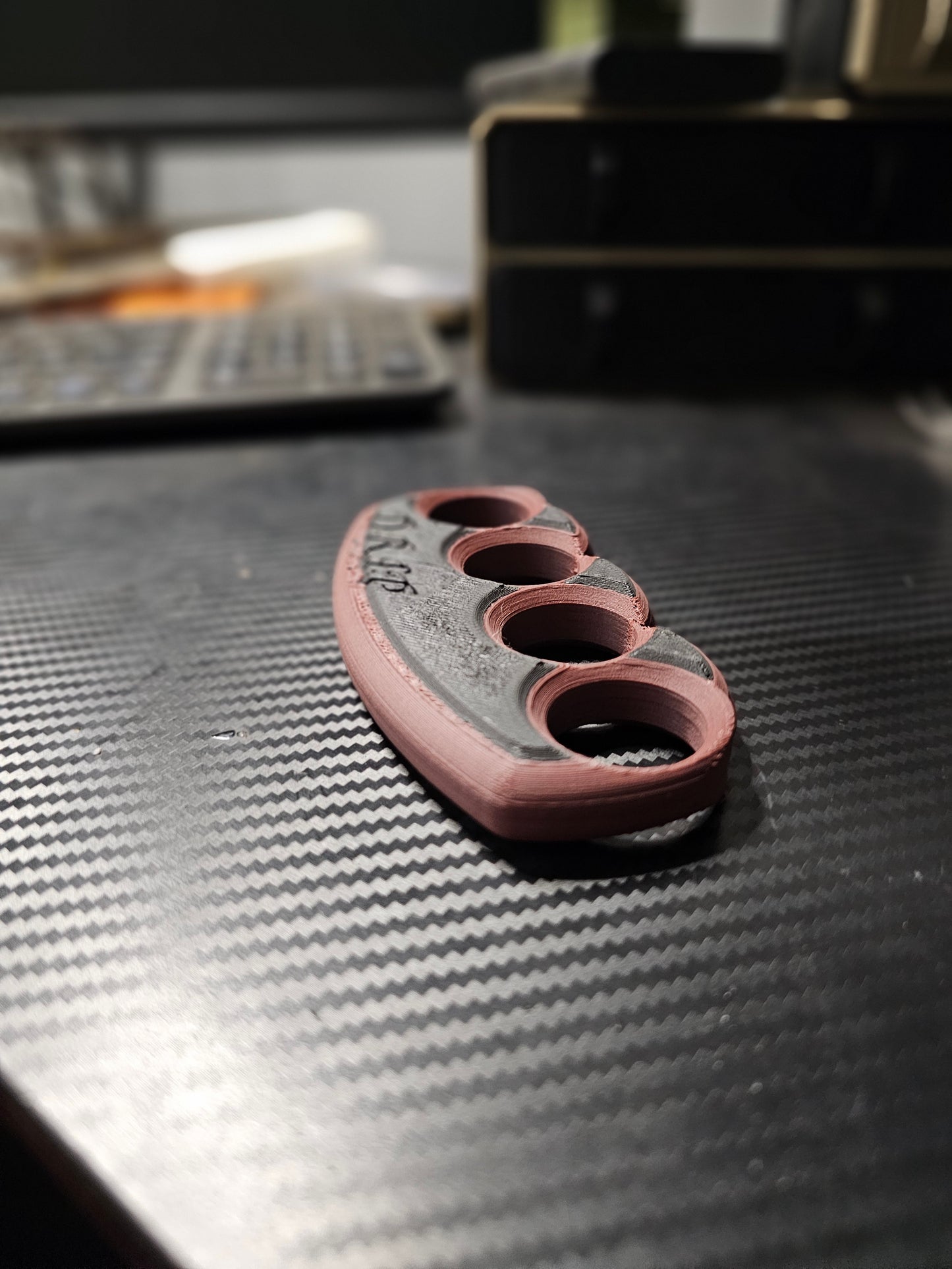 3d printed paper weight made with carbon fiber pla