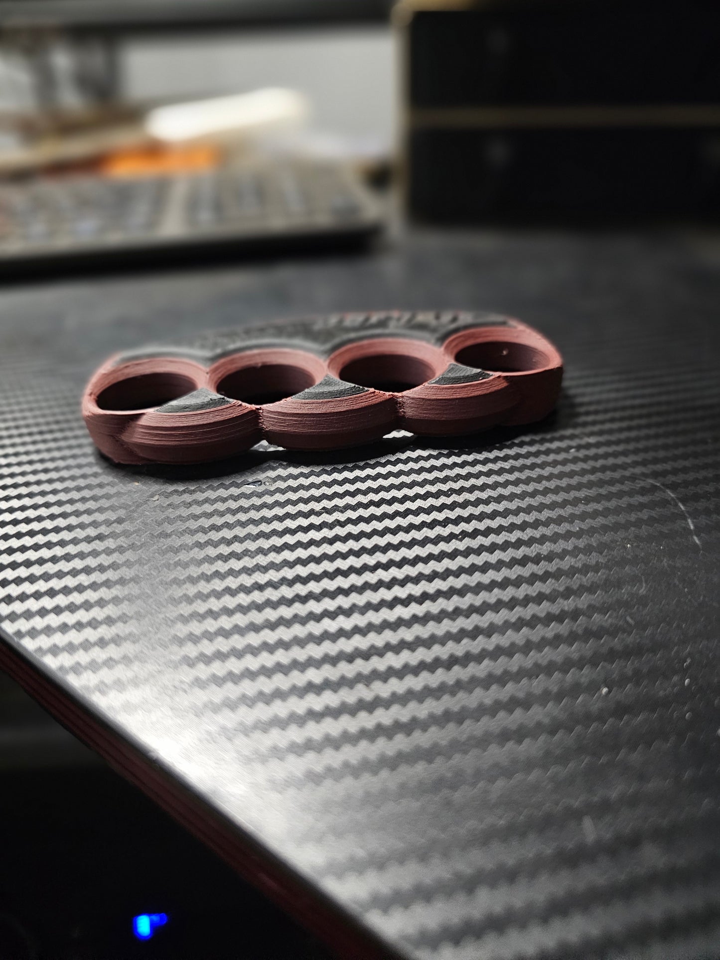 3d printed paper weight made with carbon fiber pla