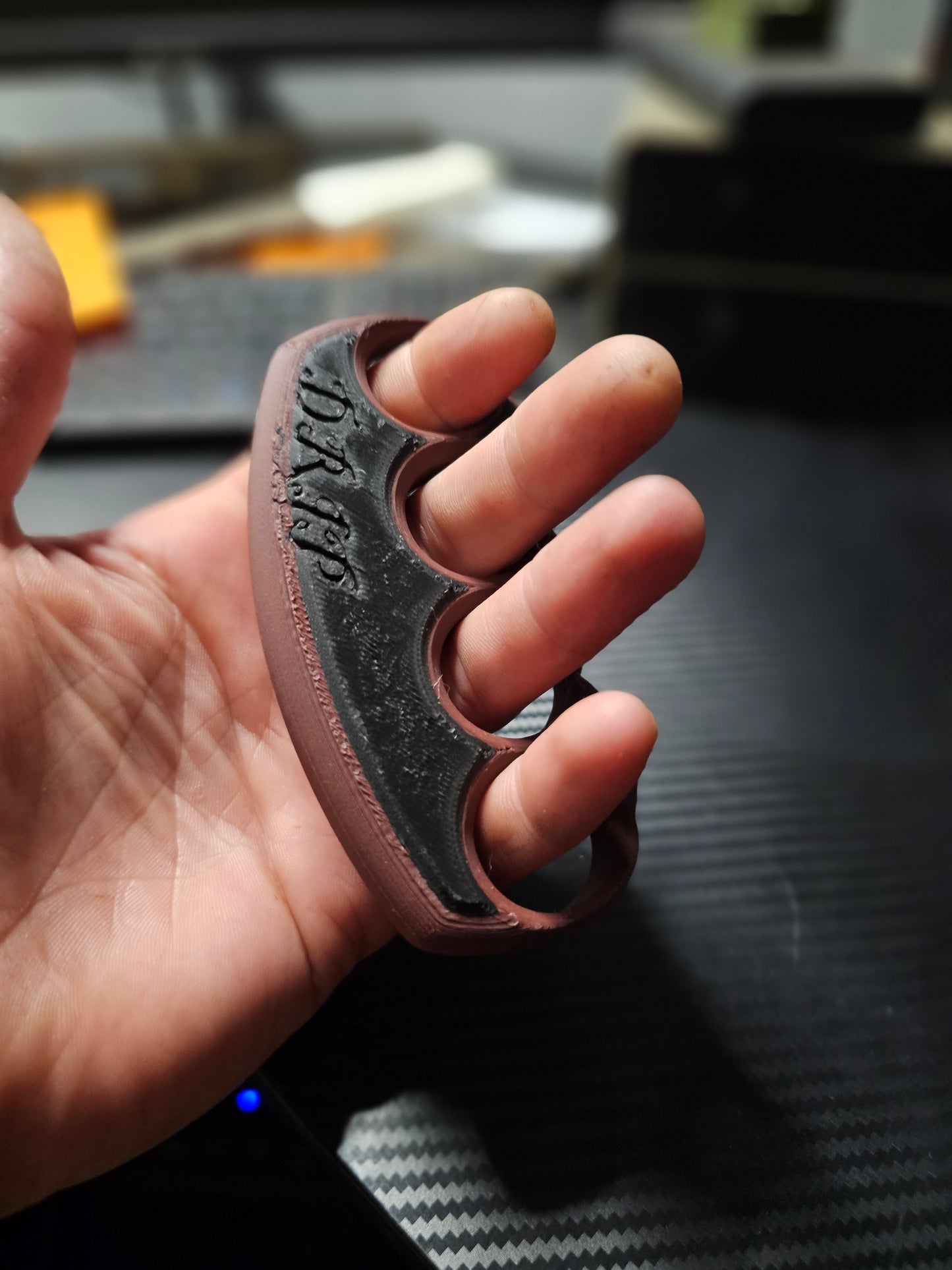 3d printed paper weight made with carbon fiber pla