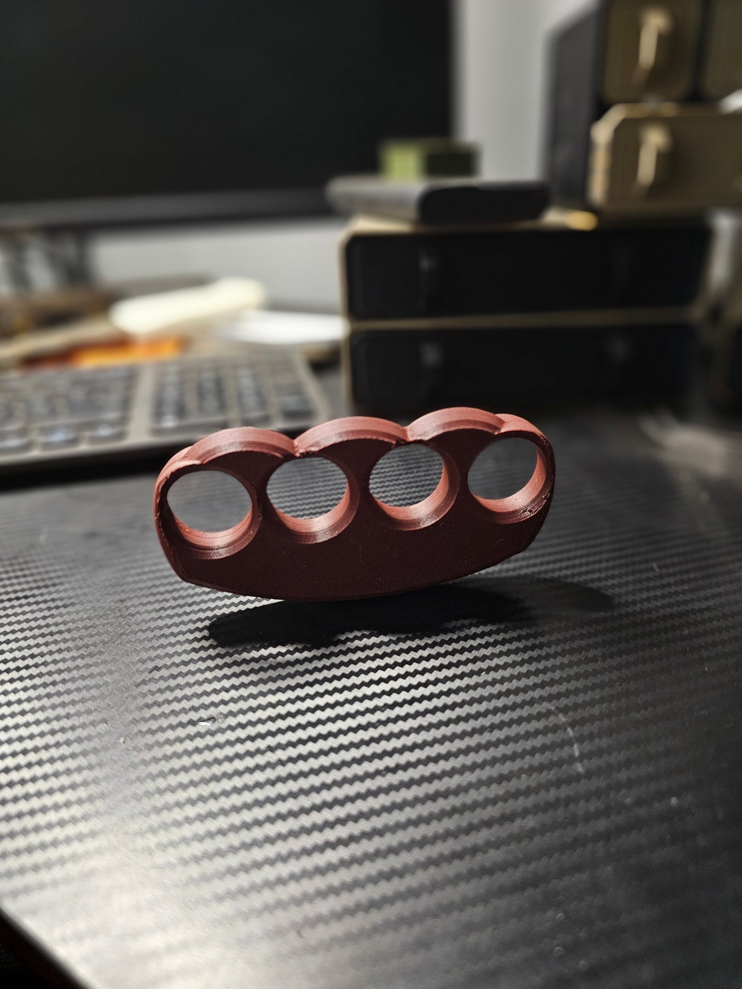 3d printed paper weight made with carbon fiber pla