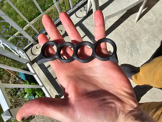 Four finger ring